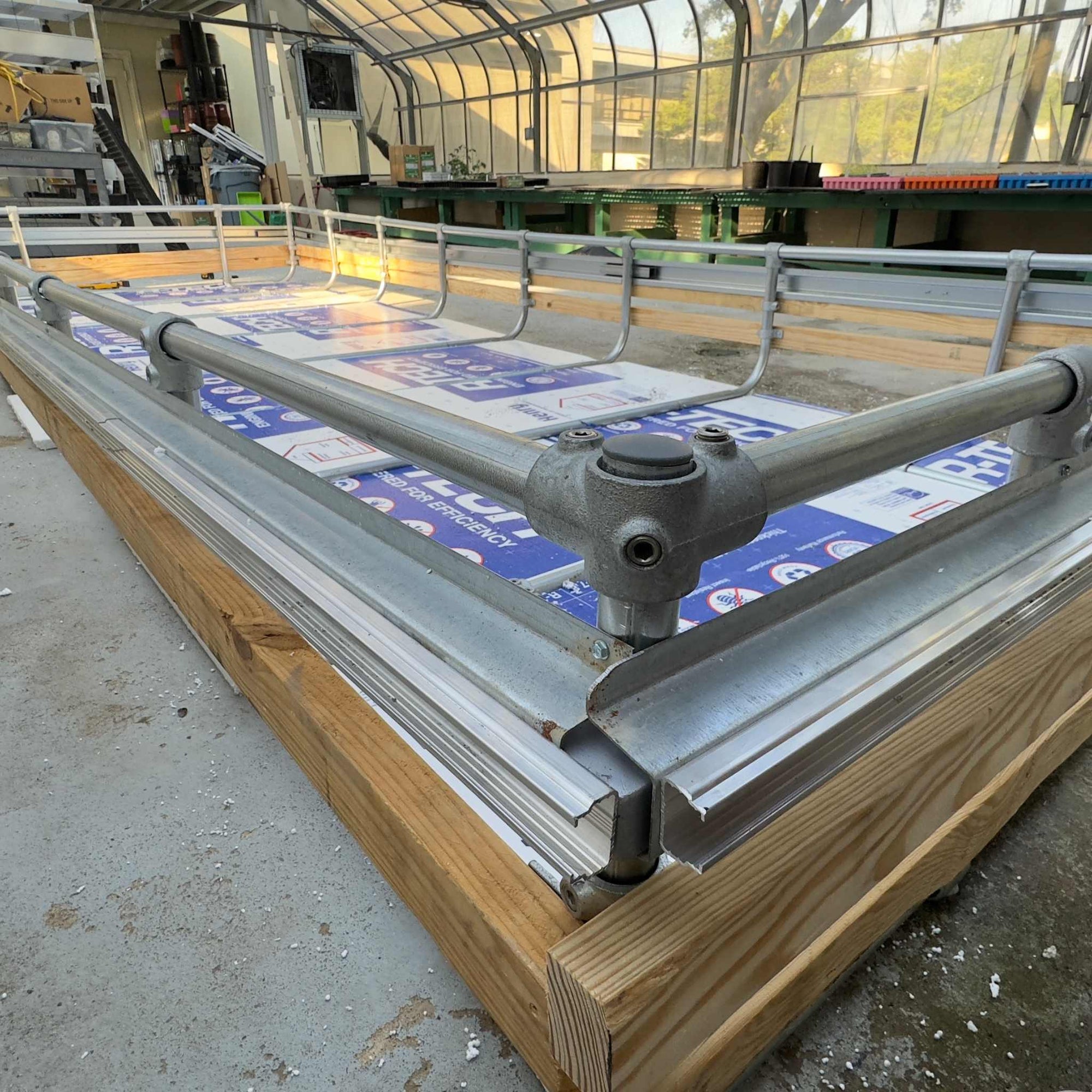 6' x 16' DWC Raft Kit with skirt rails in greenhouse
