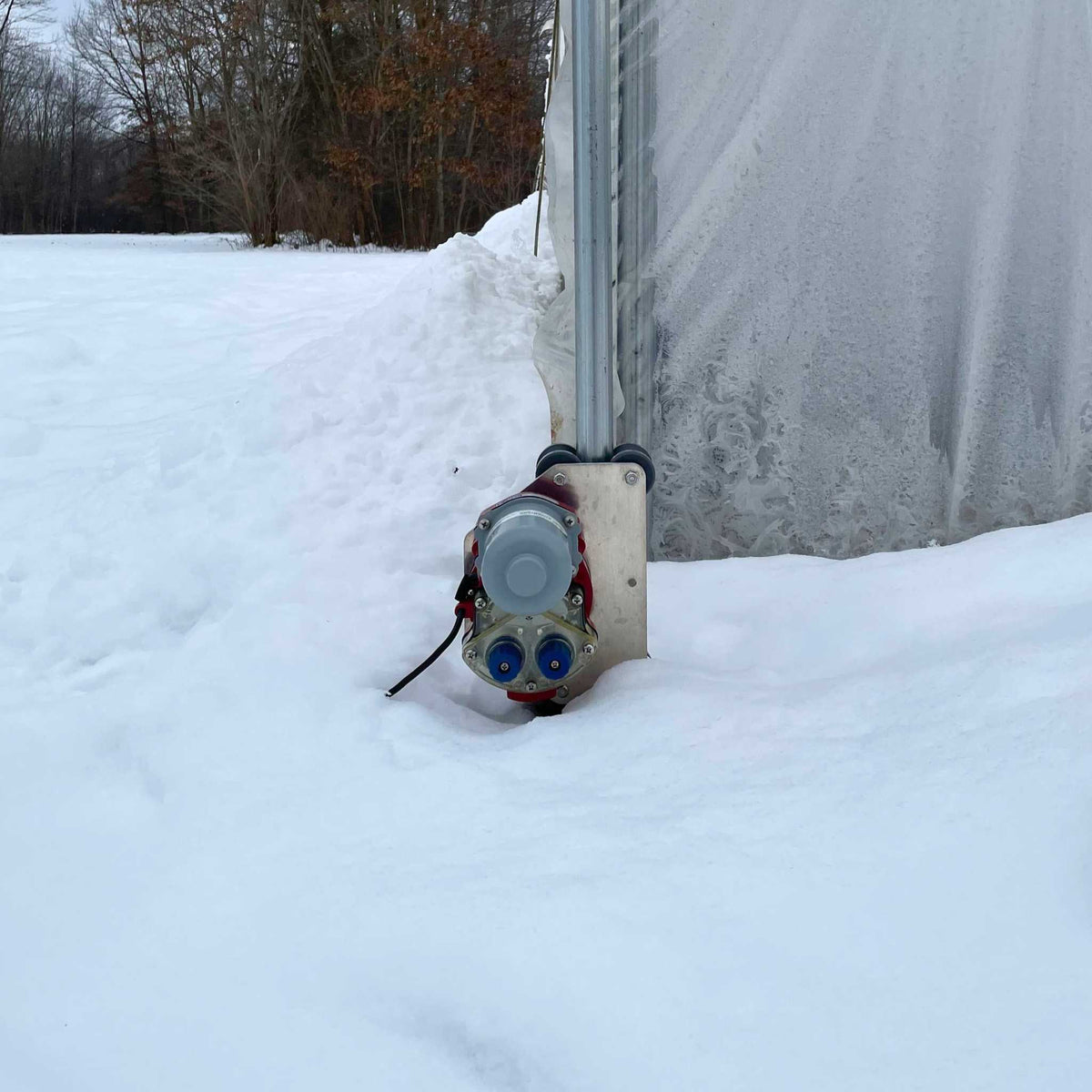 Automated Rollup Sides Installed on a hoop house