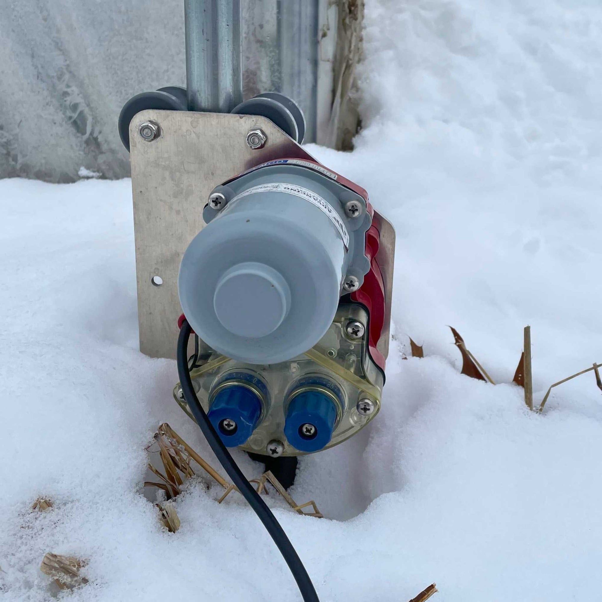 Closeup of LV60 Motor installed on a greenhouse for automated roll-up sides